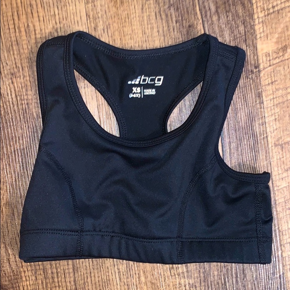 Black sports bra.  Girls XS 6-6x purple size small